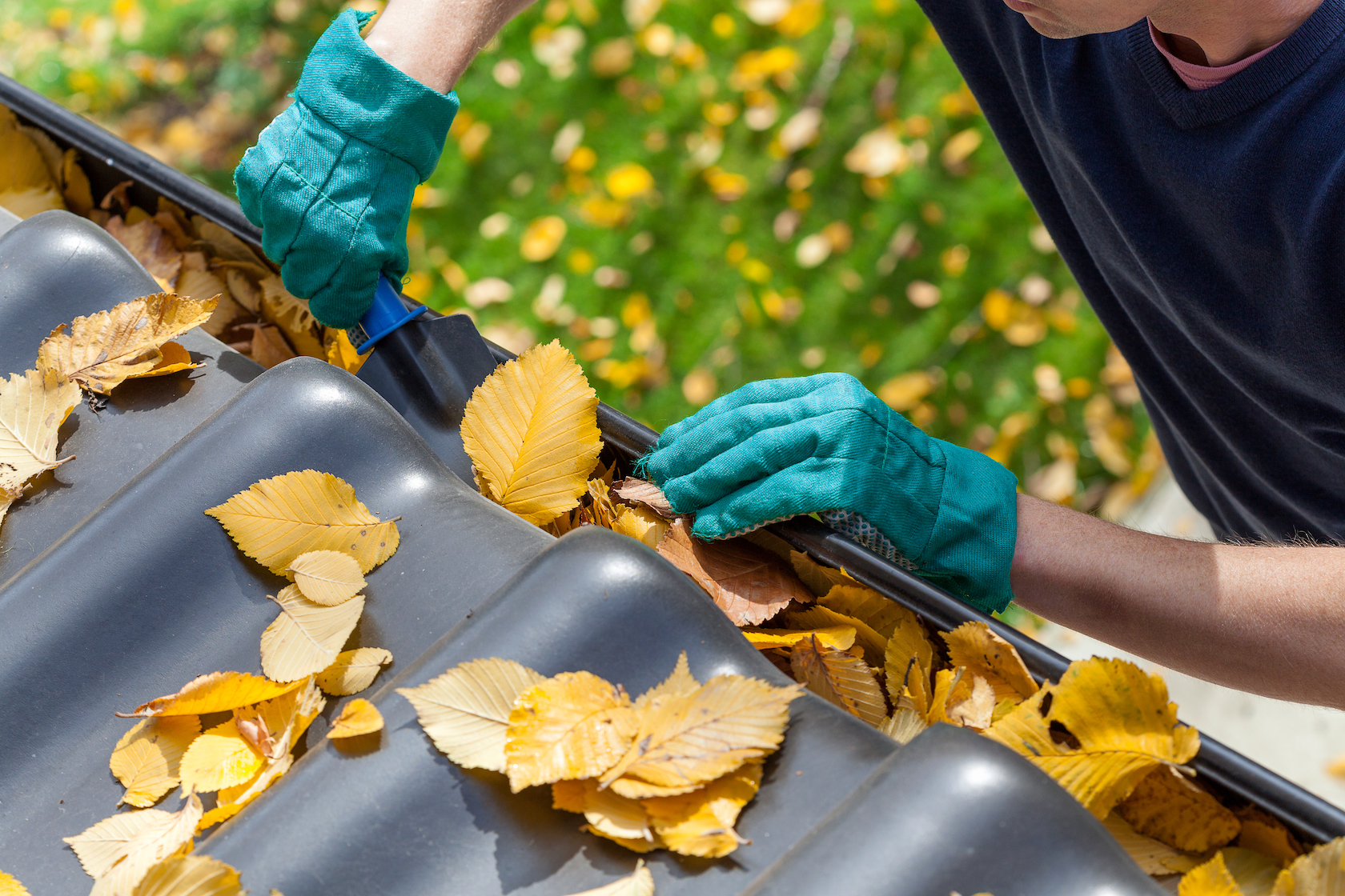 Professional gutter cleaning technician
