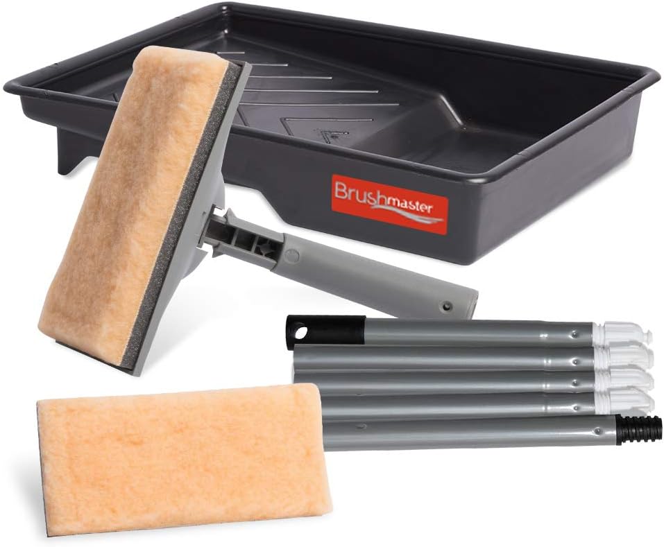 Brushmaster cleaning set featuring a black tray, mop head, spare microfiber pad, and extension poles.