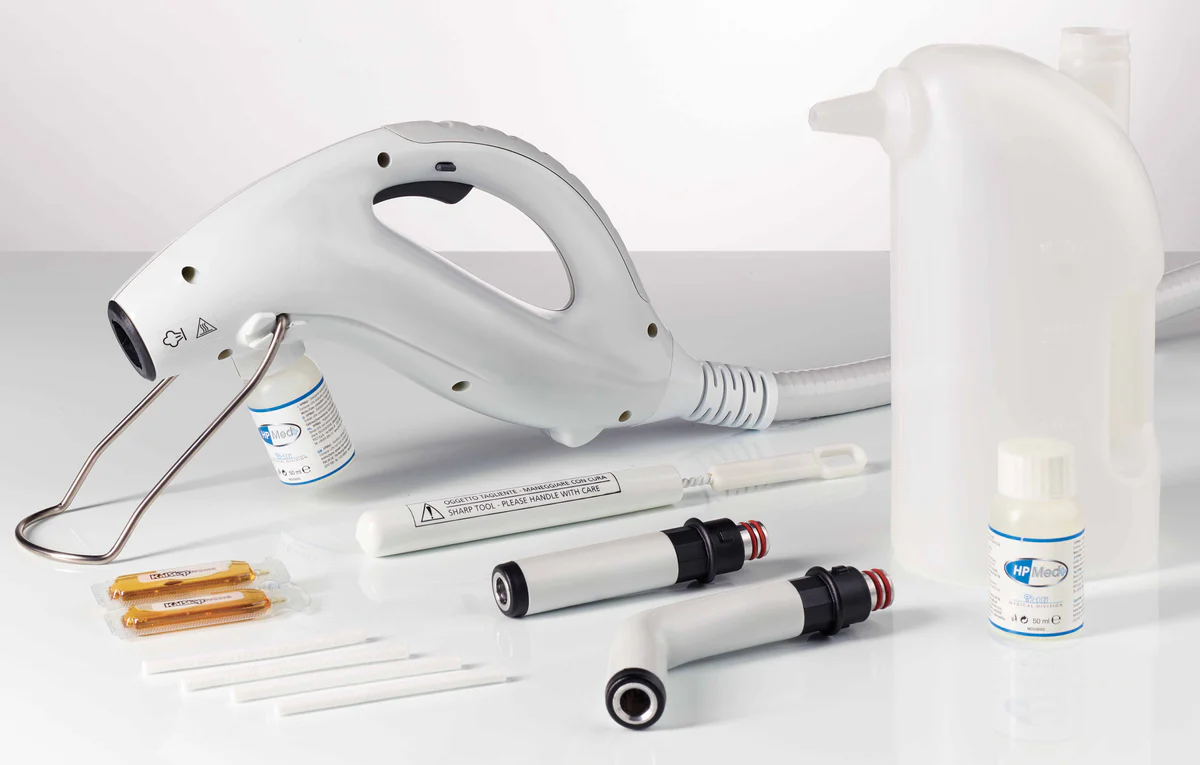 Steam disinfection medical device with a handheld unit, water reservoir, various nozzles, cleaning accessories, and solution.