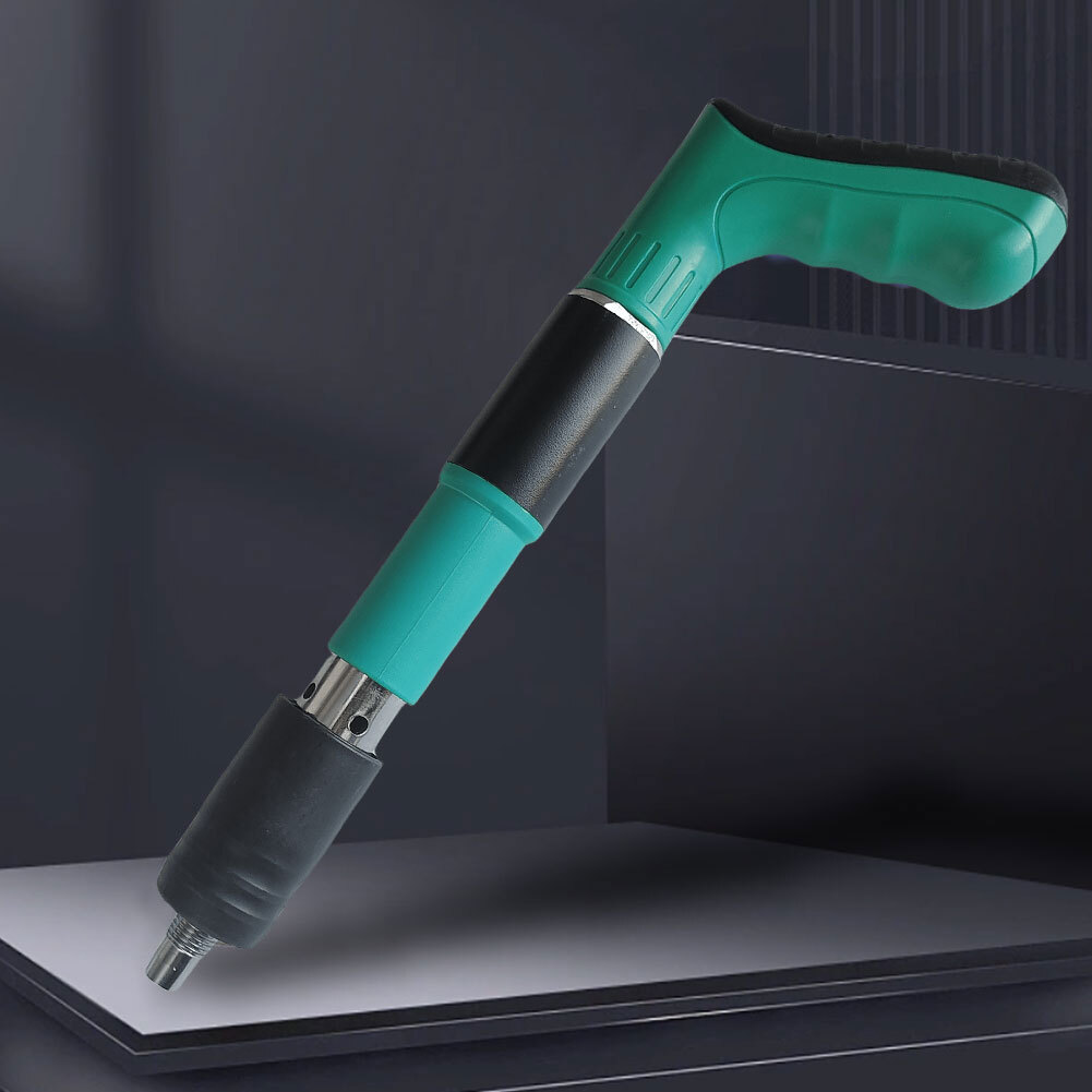 Handheld pneumatic needle scaler with a green ergonomic pistol-grip handle and black barrel on a display stand.