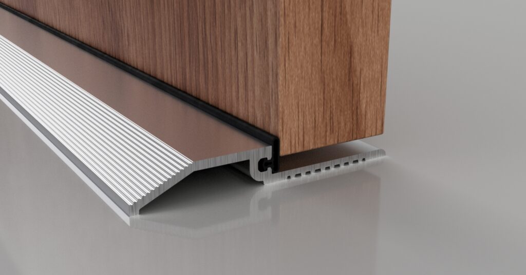 Close-up of a wooden sliding door resting on a silver aluminum track with a black rubber seal.