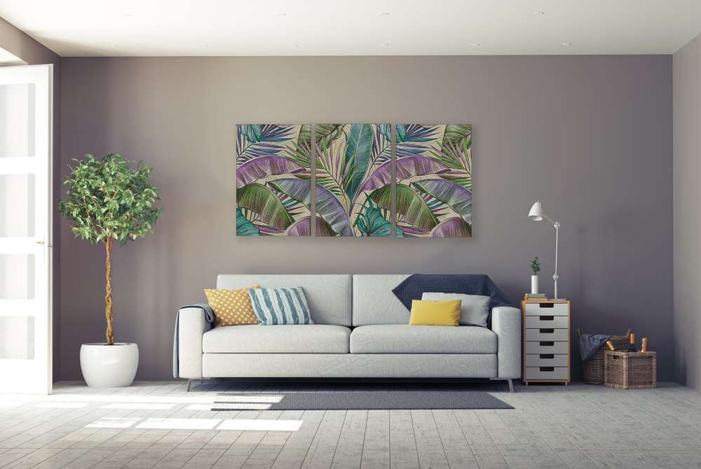 Modern living room with a gray sofa and a colorful three-panel tropical leaf painting on the wall.