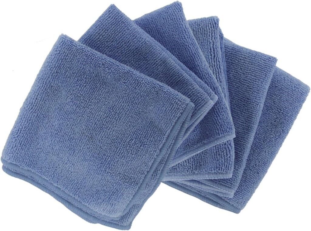 Stack of fanned-out blue microfiber cleaning cloths.