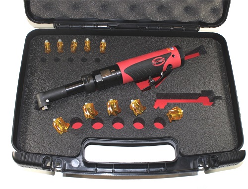 Open hard case with a red Sioux pneumatic tool and several cutter bits arranged in custom foam cutouts.