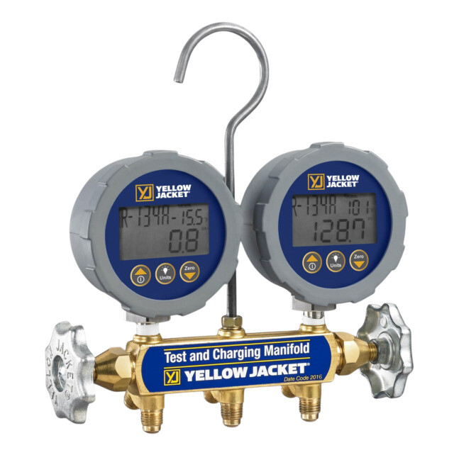 Yellow Jacket digital test and charging manifold with two pressure gauges and brass valves.