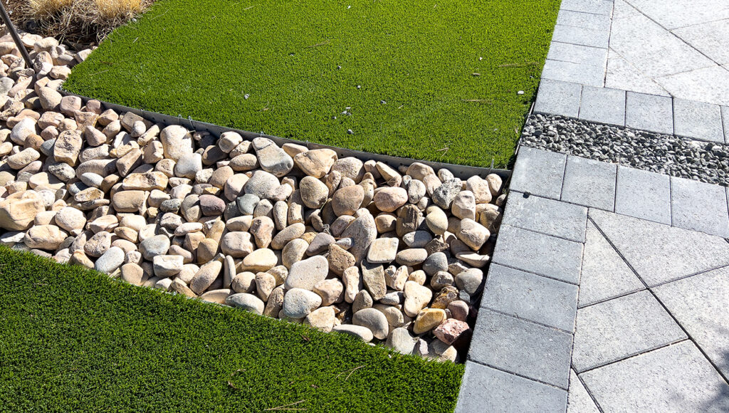 modern landscaping with artificial turf pebble path pavers