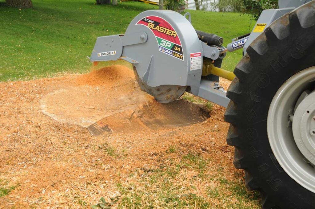Stump grinding with tractor