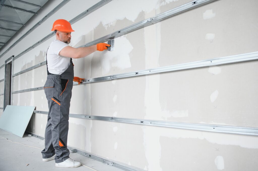 man drywall worker using trowel for plasterer putt 2026 01 09 06 30 14 utc 2